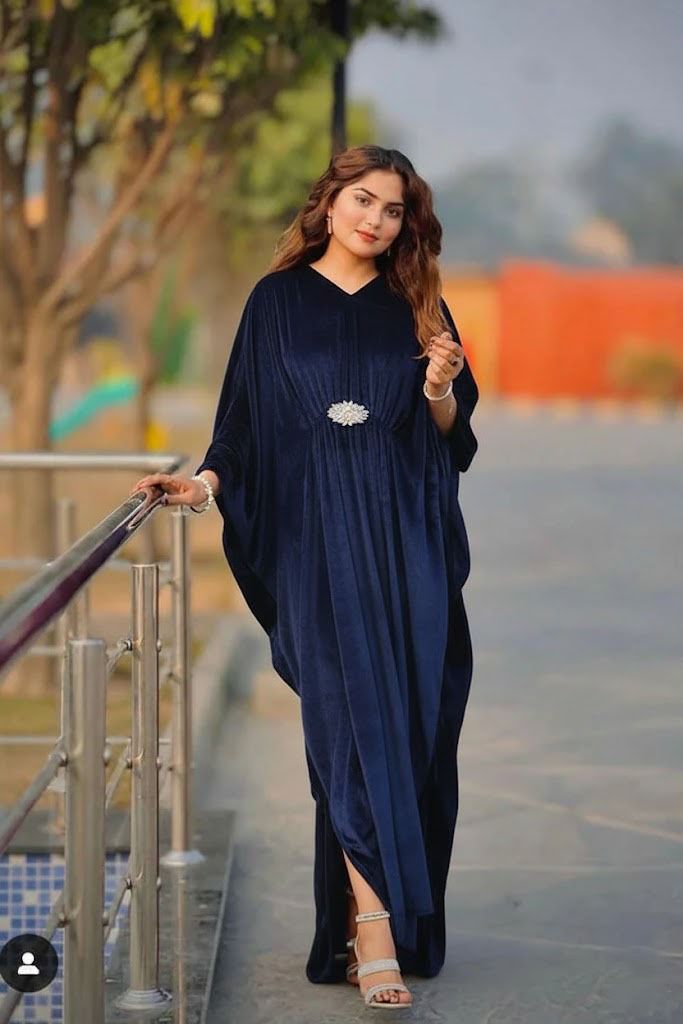 Elegant Pleated Kaftan Maxi Dress with Silver Floral Brooch